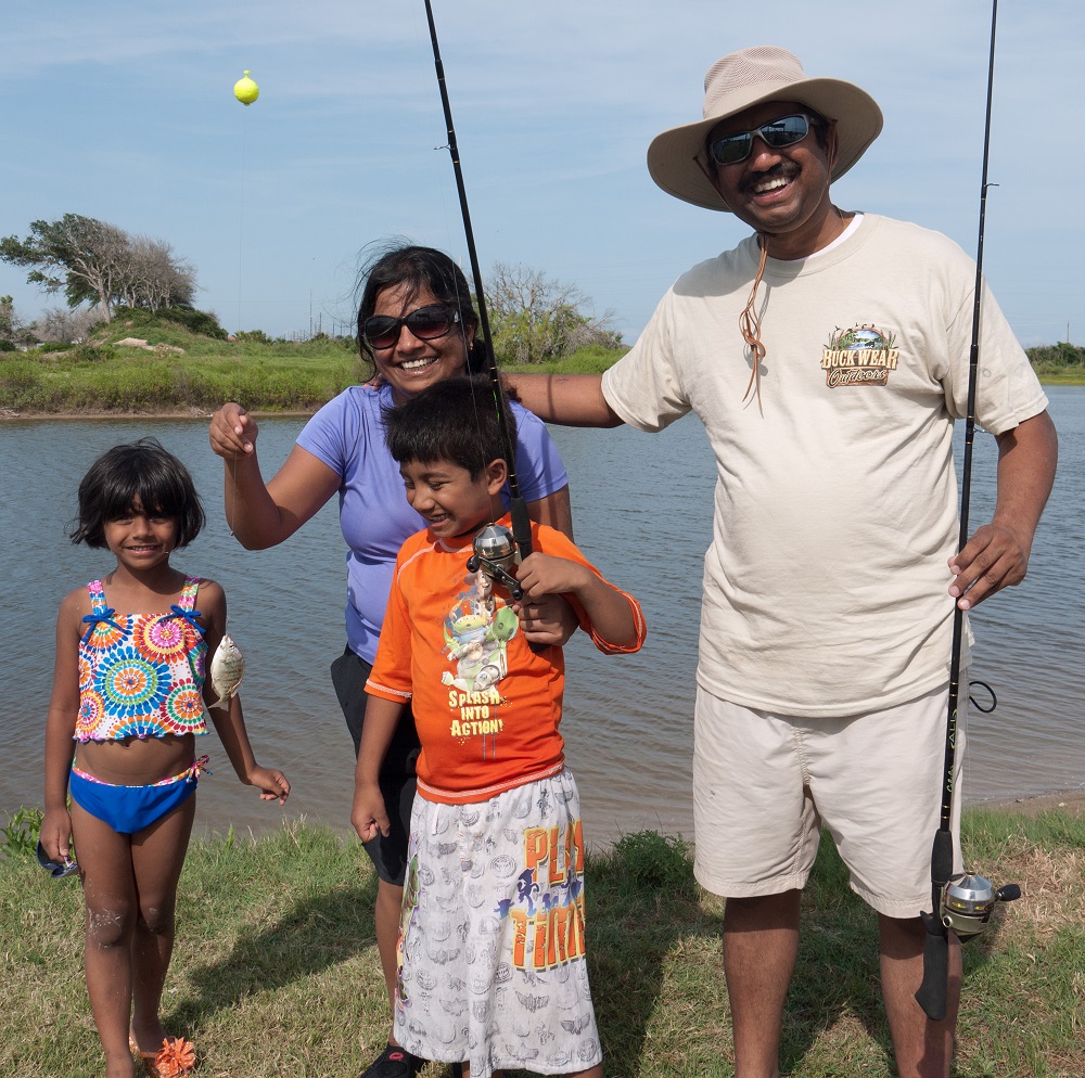 A family sharing fishing fun at a state park.