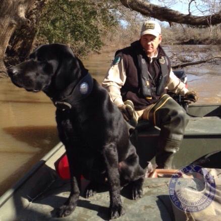 Texas Game Warden and canine partner.