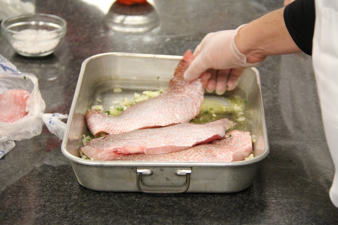 Preparing red snapper at Central Market Cooking School in Austin. Image: Bruce Biermann